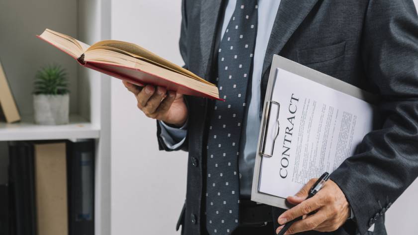 businessman-holding-book-clipboard-with-contract