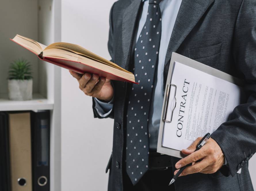 businessman-holding-book-clipboard-with-contract